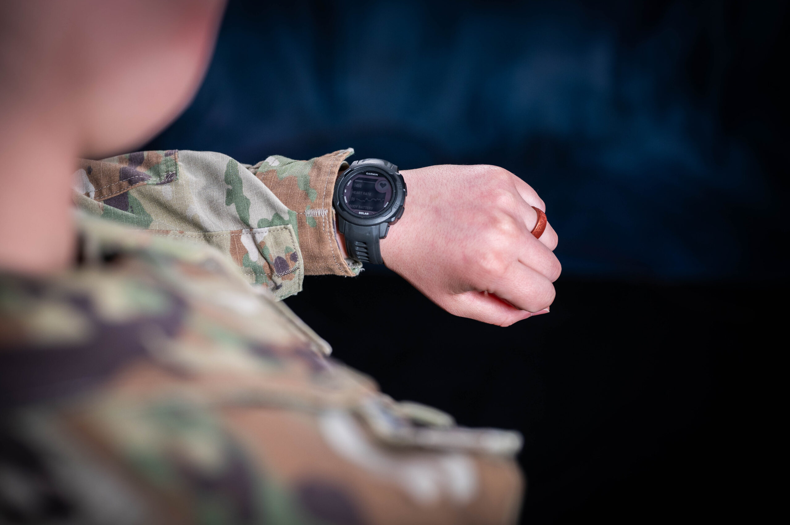 airman wearing monitoring device