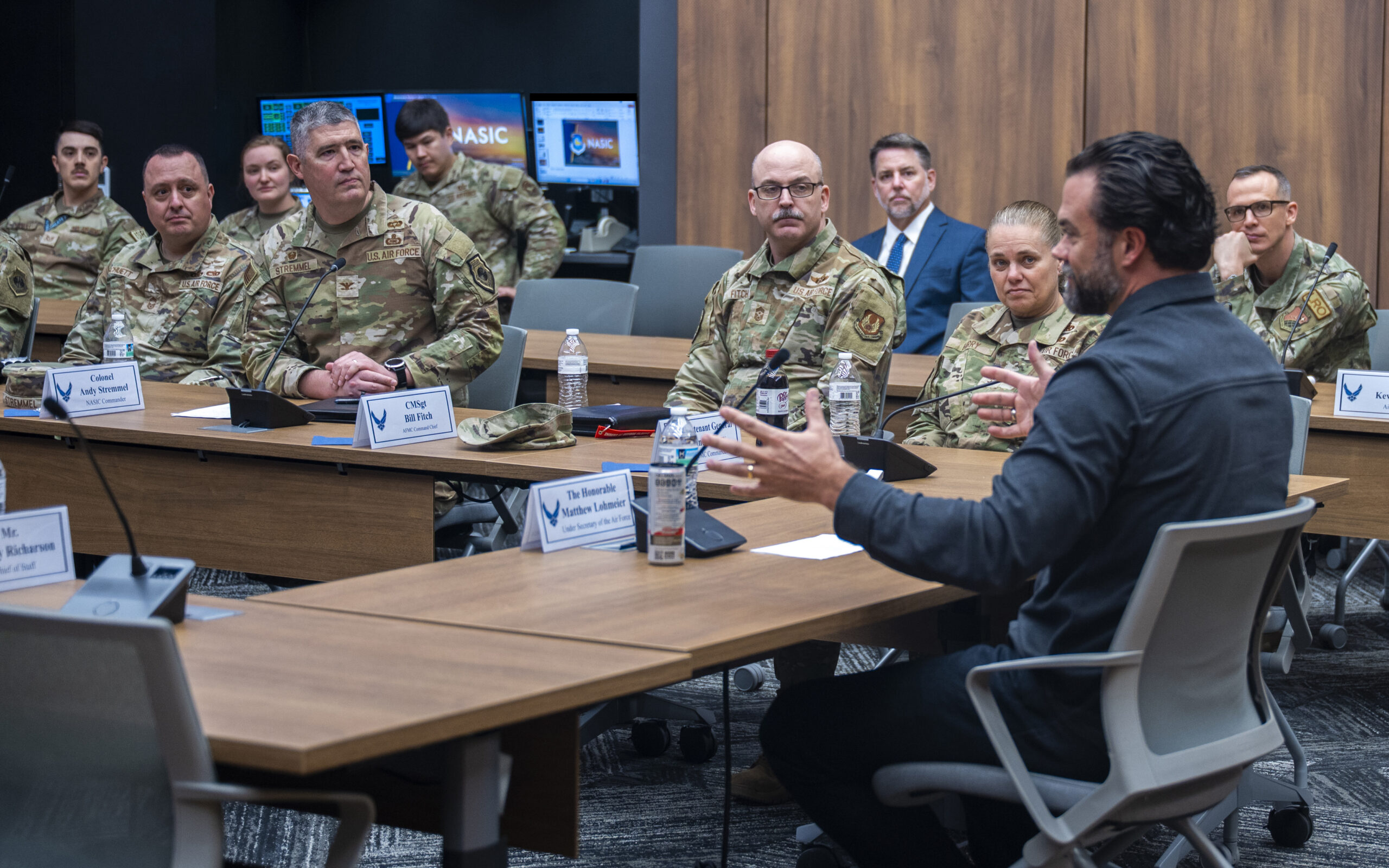 Under Secretary of the Air Force Matt Lohmeier engages in conversation with leadership