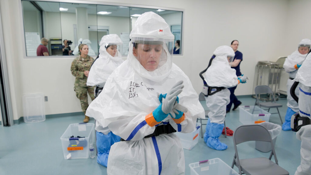 Air Force medical personnel preparing for infectious control training