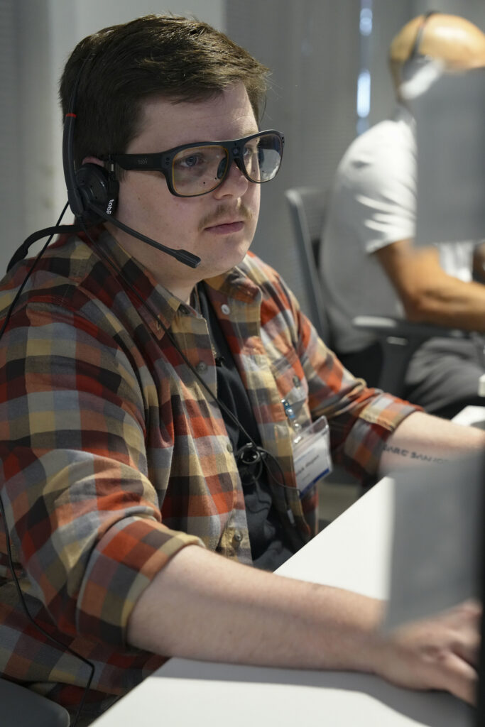 team leader participating in demonstration of MASH experiment
