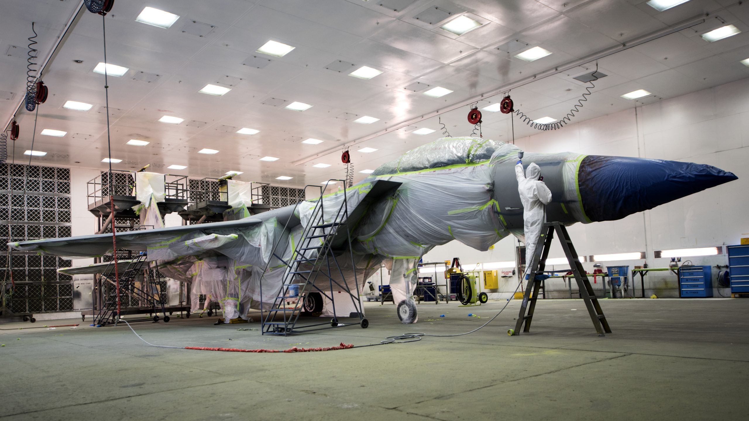 Aircraft in hangar undergoing maintenance