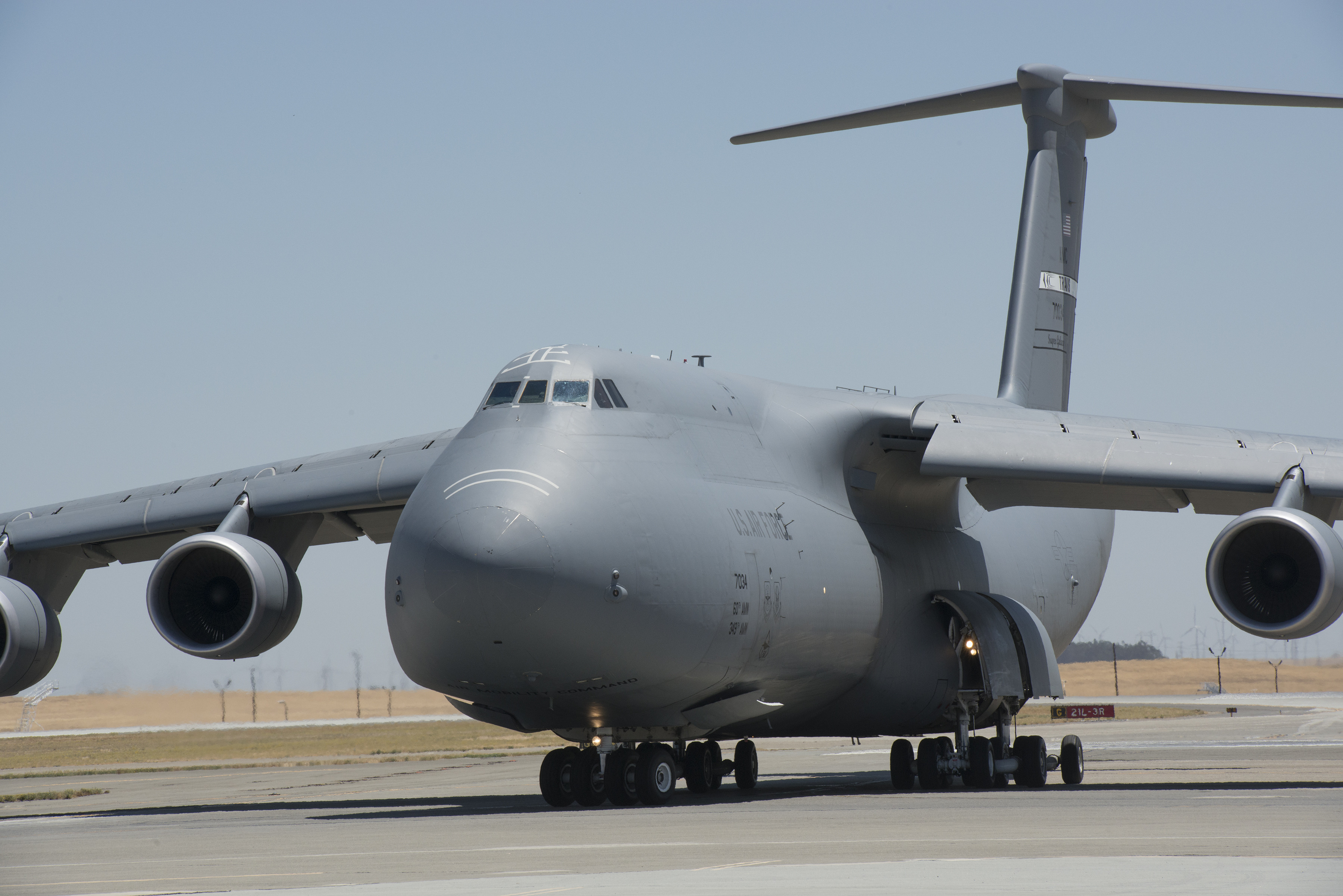 A C-5 M Super Galaxy on the ramp at Travis AFB, Calif., July 28, 2015. As the Air Force’s largest and only strategic airlifter, the C-5M Super Galaxy can carry more cargo farther distances than any other aircraft. This C-5M Super Galaxy is an upgraded version with new engines and modernized avionics designed to extend its service life beyond 2040. (U.S. Air Force Photograph by Heide Couch/Released)