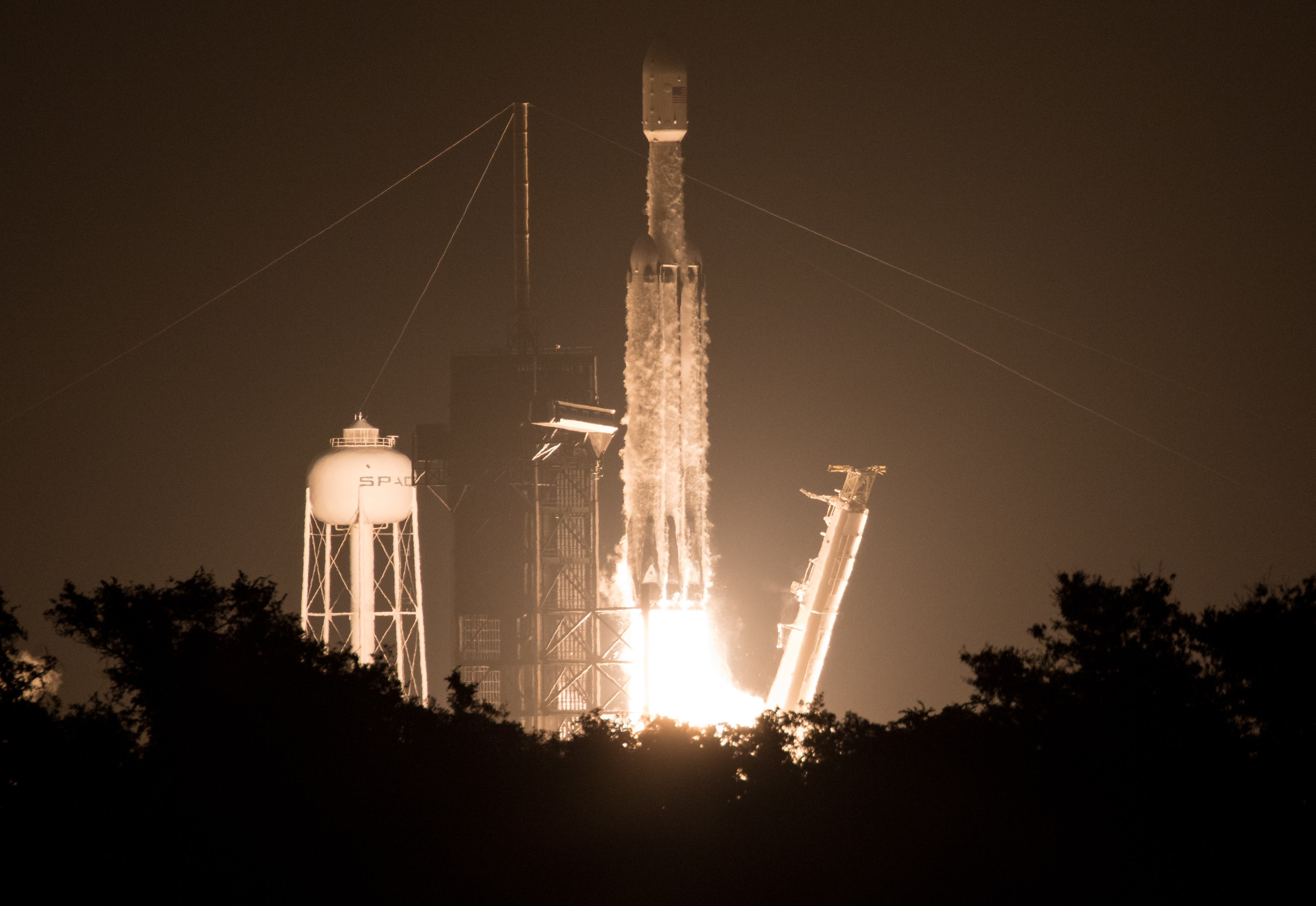 A SpaceX Falcon Heavy rocket carrying 24 satellites as part of the Department of Defense's Space Test Program-2 (STP-2) mission launches from Launch Complex 39A at NASA's Kennedy Space Center in Florida June 25, 2019. The satellites include two AFRL technology and science payloads. (NASA photo/Joel Kowsky)