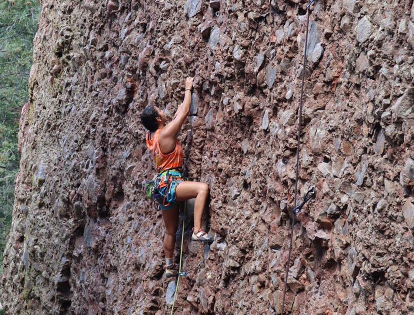 image of officer rock climbing