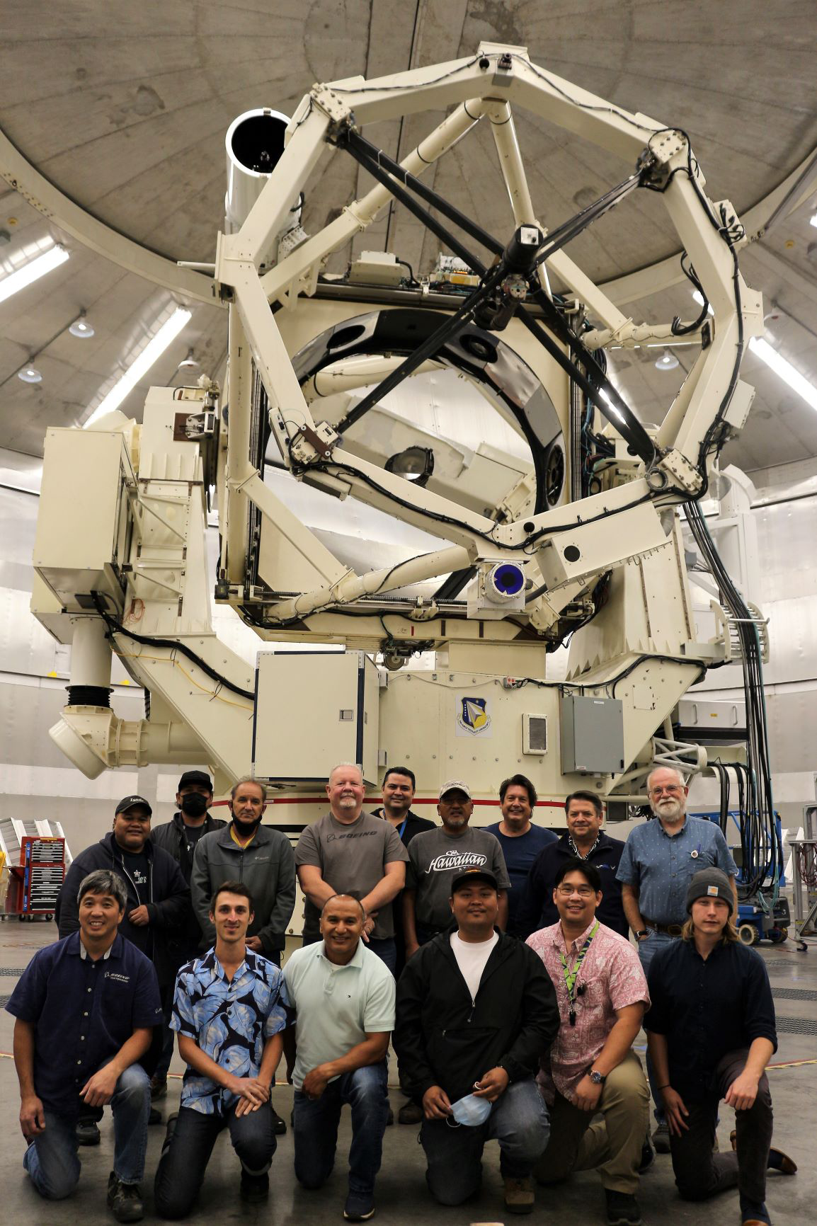 image of team and AEOS telescope