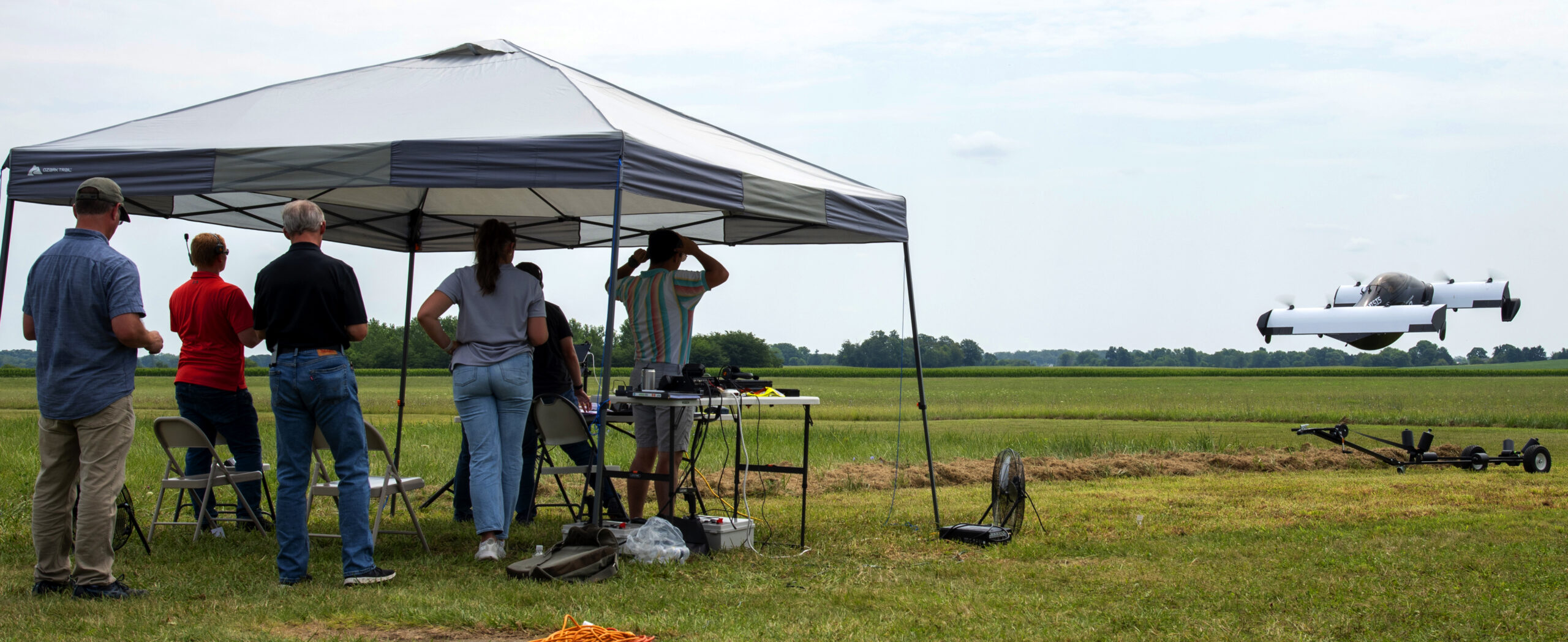 experts watching aircraft testing