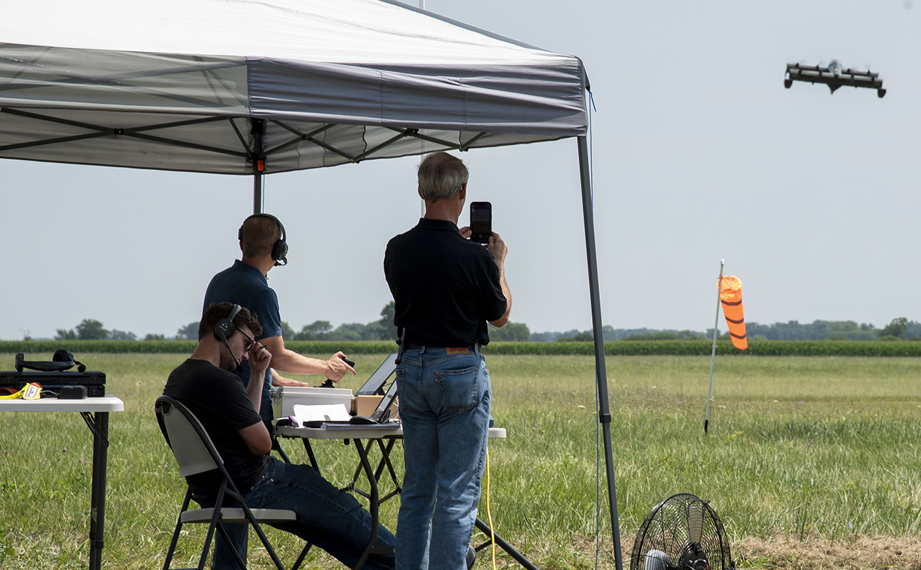 experts testing aircraft flying