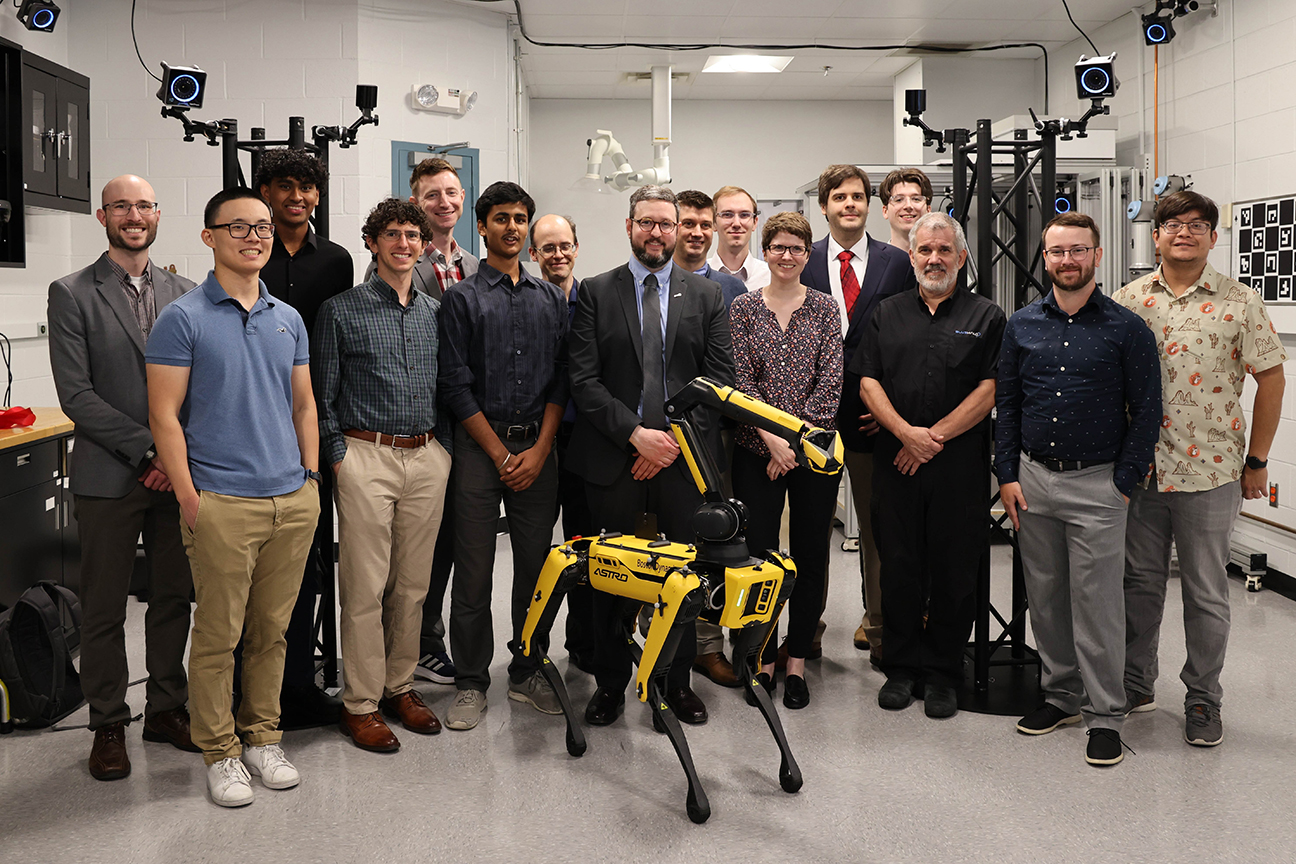 CAMS lab research team posing during ribbon cutting ceremony