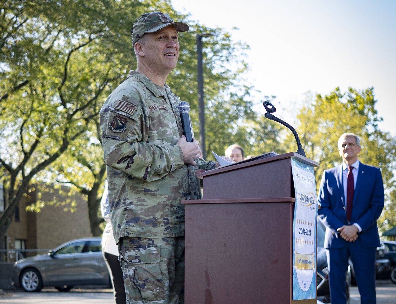 AFRL Commander addressing leaders during celebration