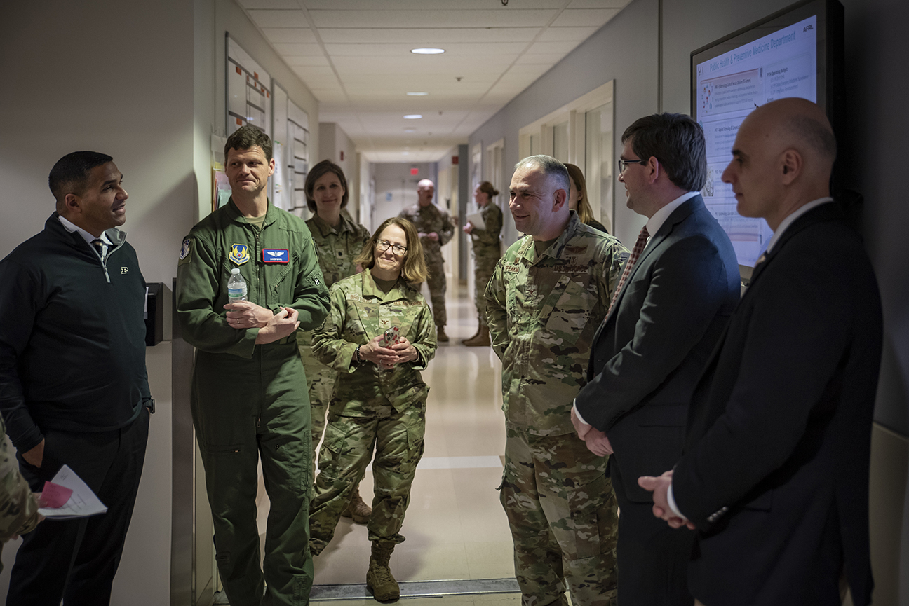 leaders gathering during tour of facilities