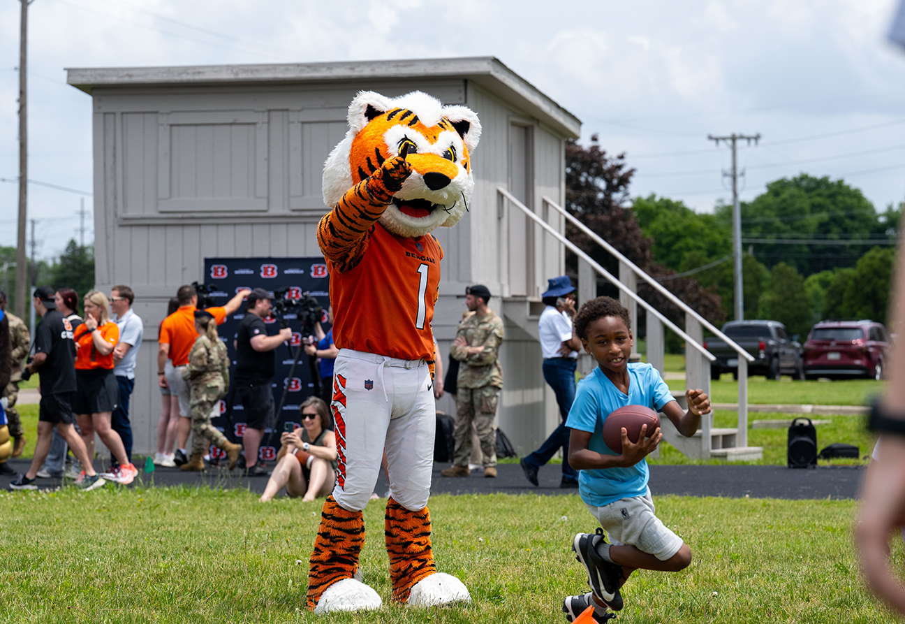 Bengals mascot and military children during skills clinic