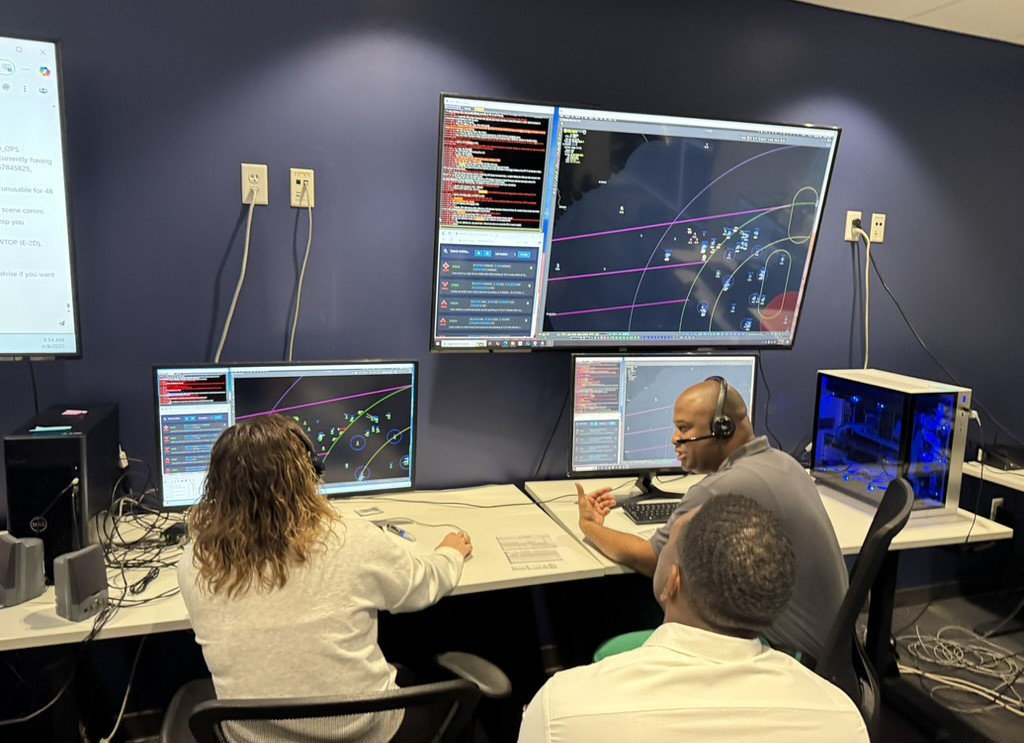 attendees learn about DASH experiment during event