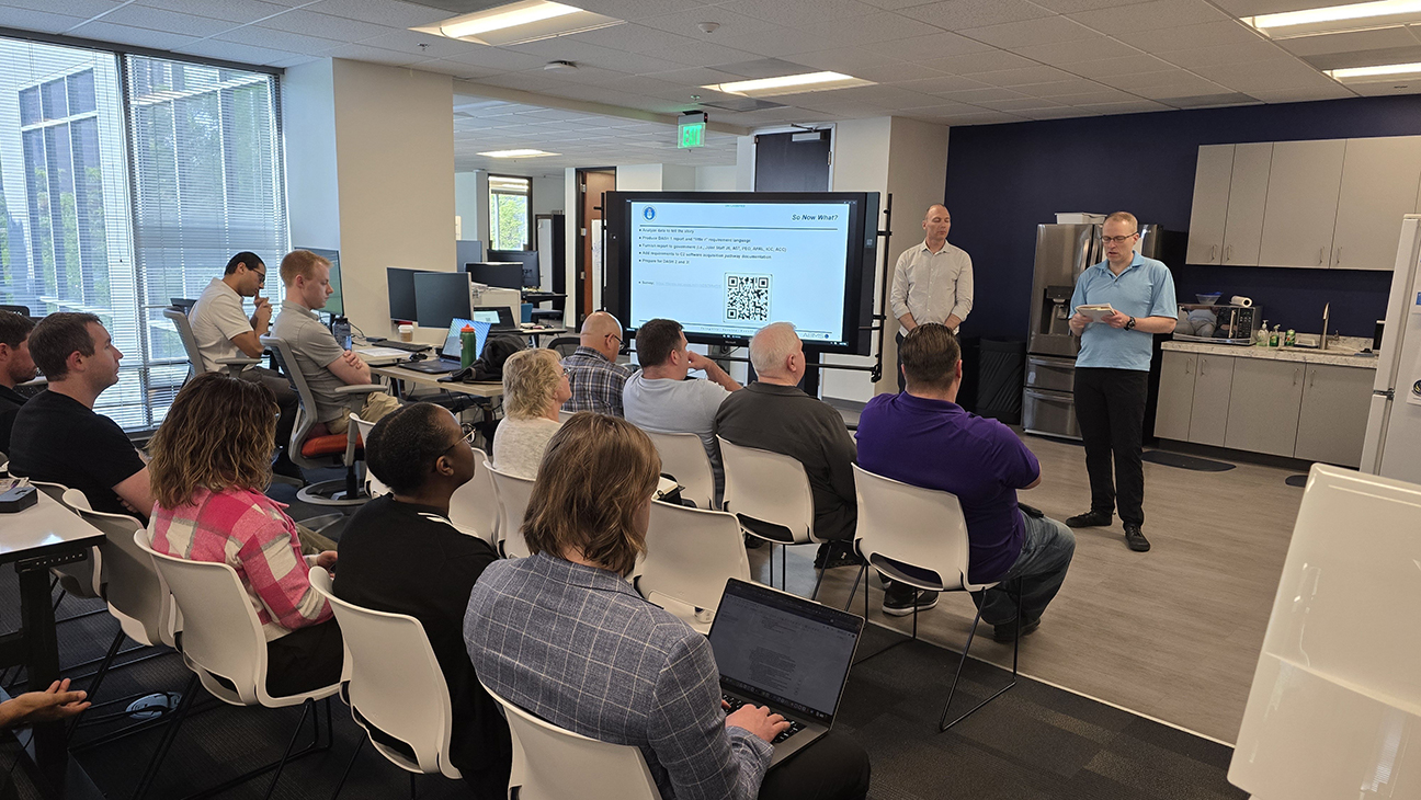 attendees take in presentation during DASH event